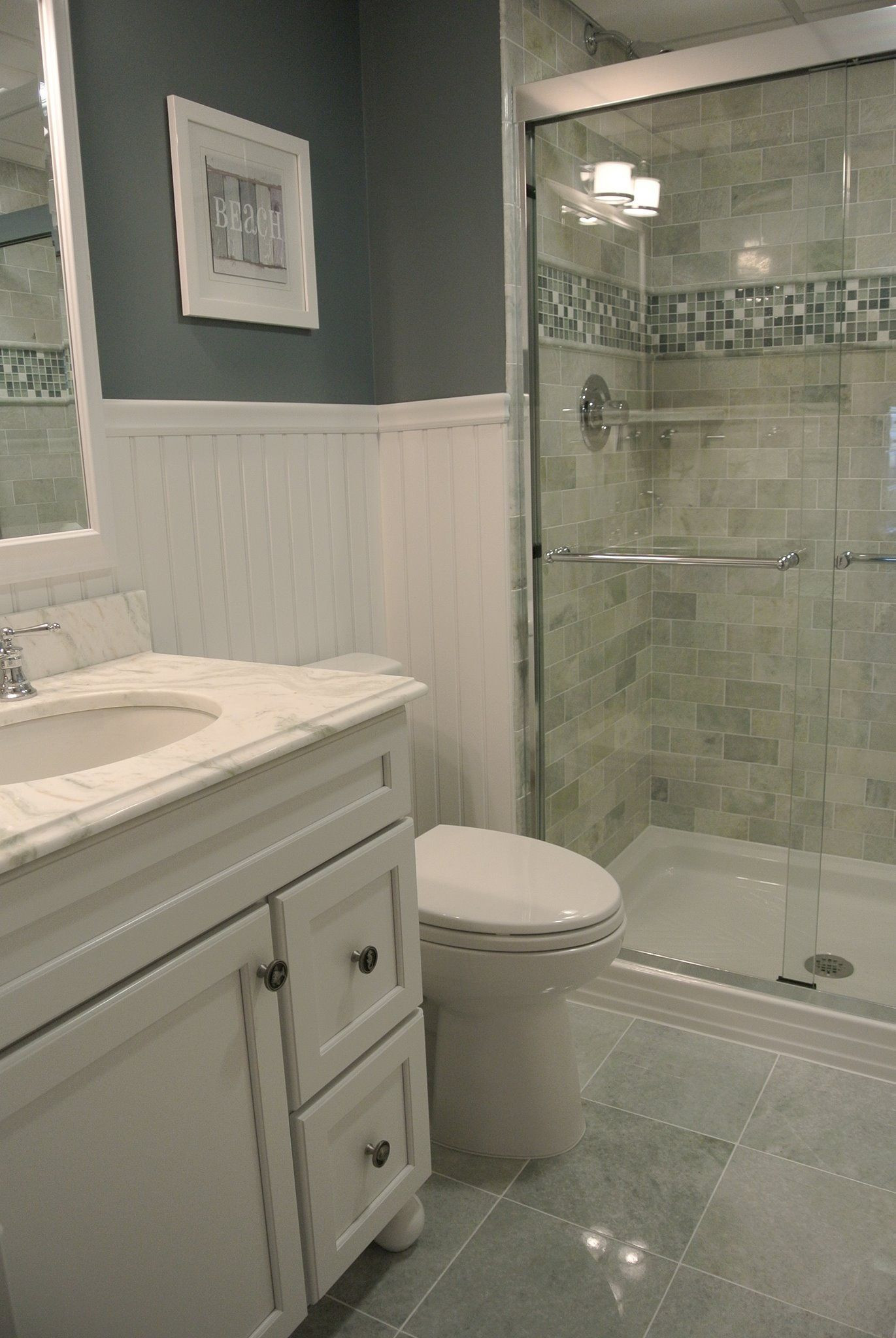 Small Beach Bathroom Ideas
 Beach condo bathroom Ming green marble tile …