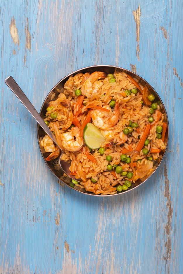 Spanish Rice Dish With Seafood
 Traditional spanish paella dish with seafood peas rice