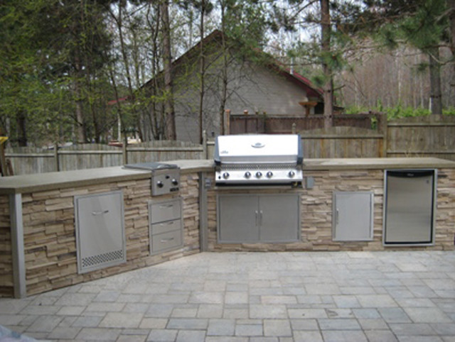 Stone Outdoor Kitchen
 Stacked Stone Outdoor Kitchen Traditional Patio