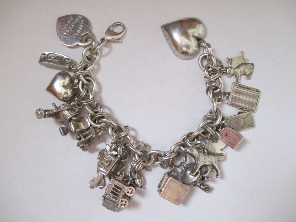 Tiffany Bracelet Charms
 Return to Tiffany Sterling Silver Vintage Heart Charm