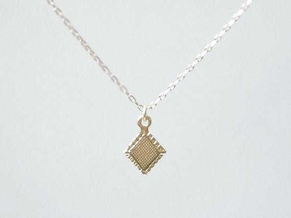 Tiny Diamond Necklace
 Tiny gold diamond necklace tiny diamond charm on 14K by illusy