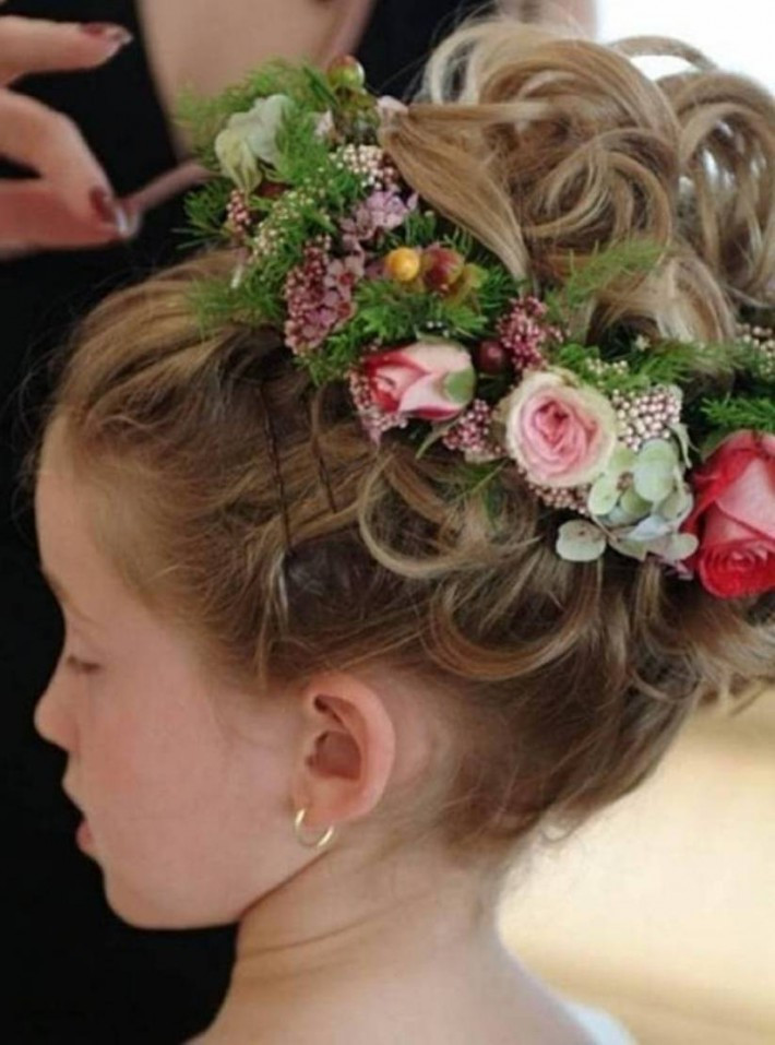 Updos Hairstyles For Little Girls
 Lovely updo for girls with curls and flower decorations
