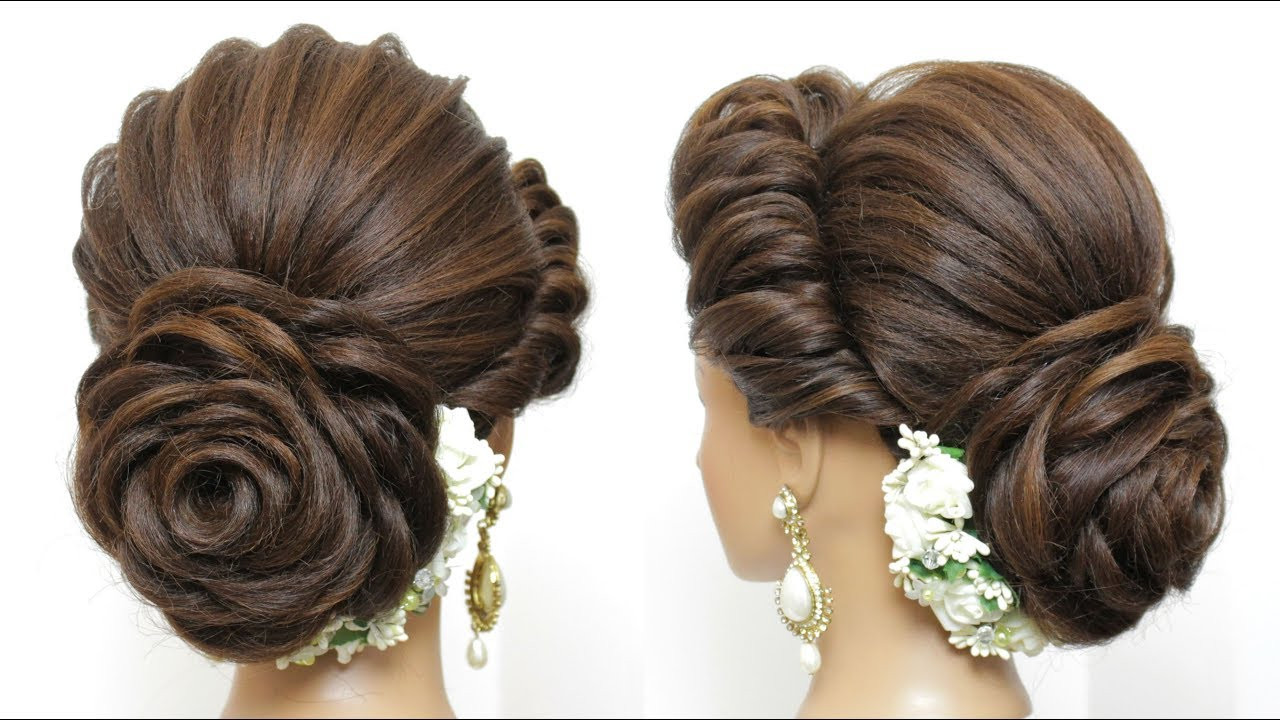 Wedding Bun Hairstyle
 New Bridal Hairstyle With Flower Bun For Long Hair