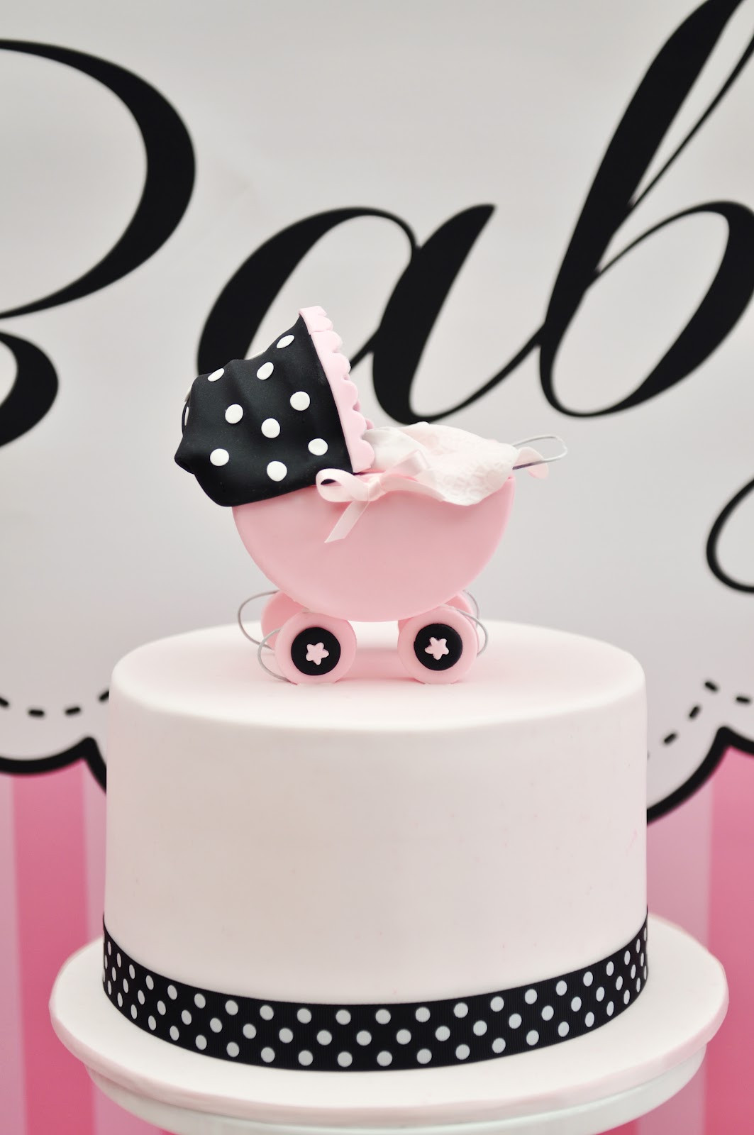 White Baby Shower Cake
 Studio Cake Pink white and Black baby shower