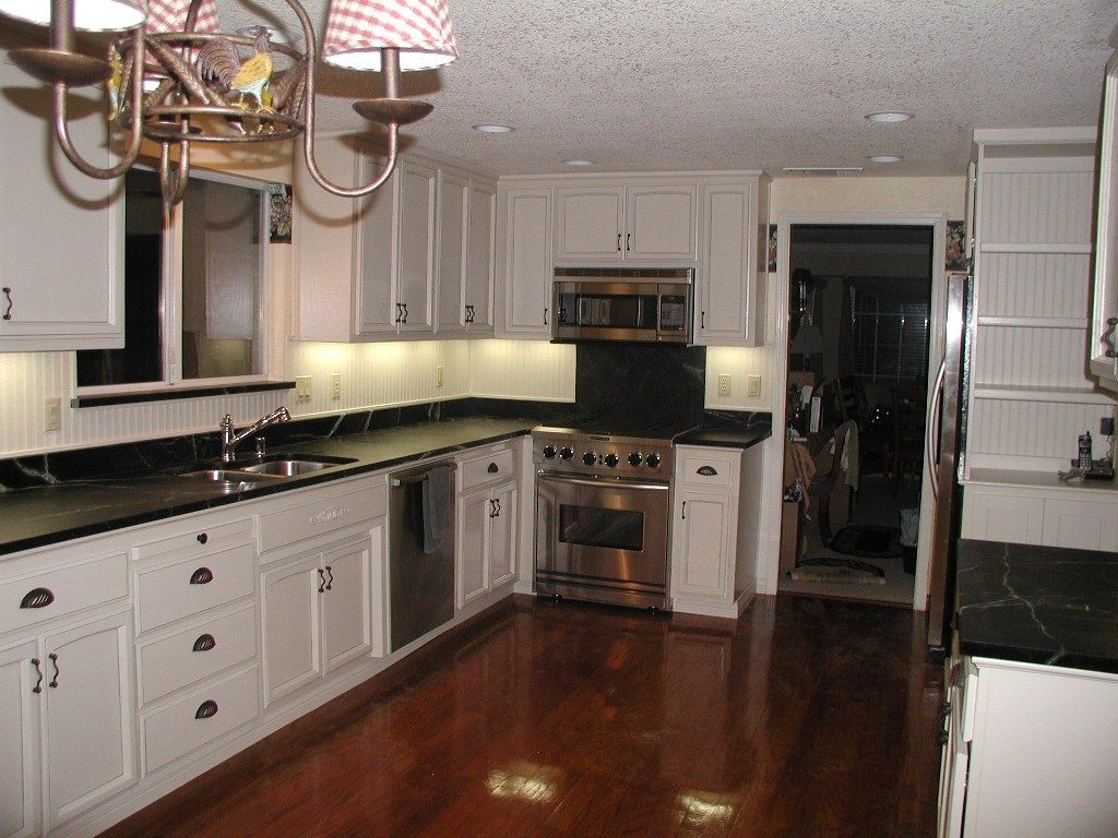 White Kitchen With Black Granite
 kitchens with white cabinets and black countertops