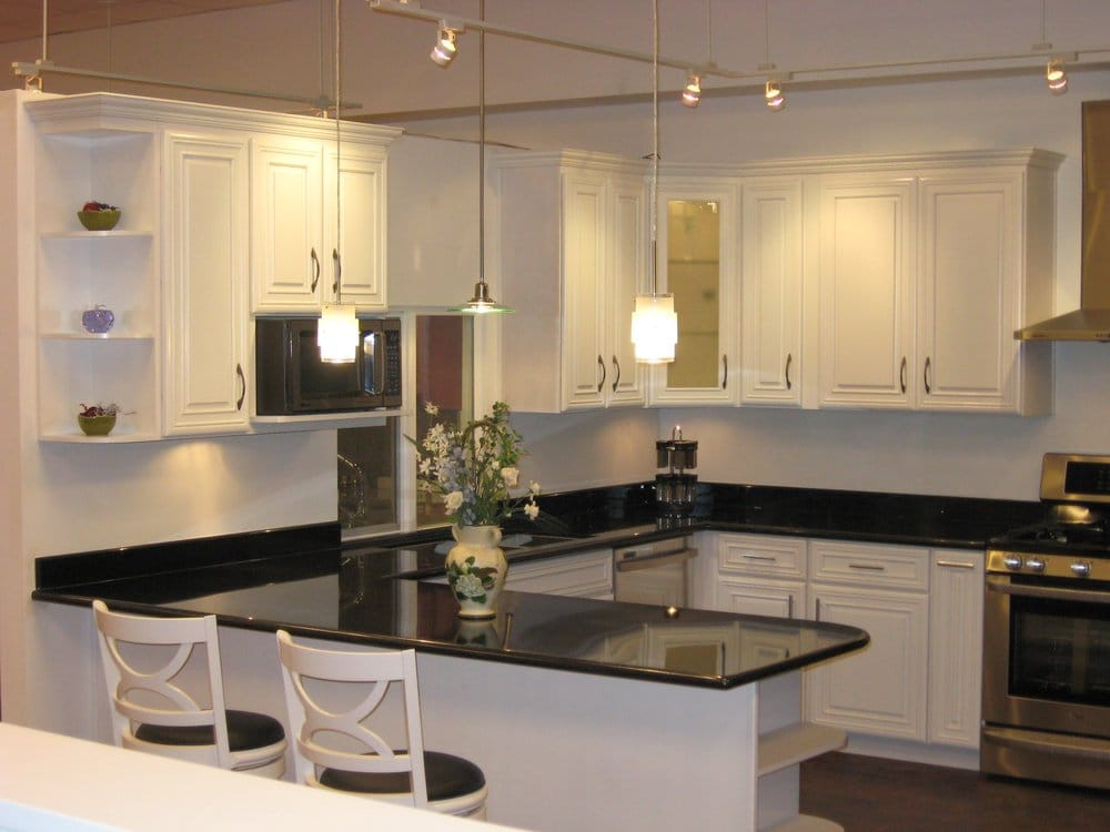 White Kitchen With Black Granite
 White Ivory Maple Cabinets with Black Galaxy Granite Yelp