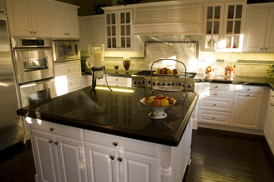 White Kitchen With Black Granite
 Black Granite Countertop With White Kitchen Appliance
