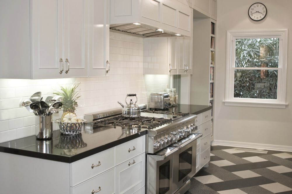 White Kitchen With Black Granite
 White Kitchen Theme as Cabinetry feat Black Countertop and